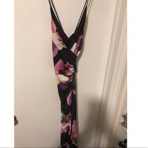 Brand new, beautiful lace up in back maxi dress.